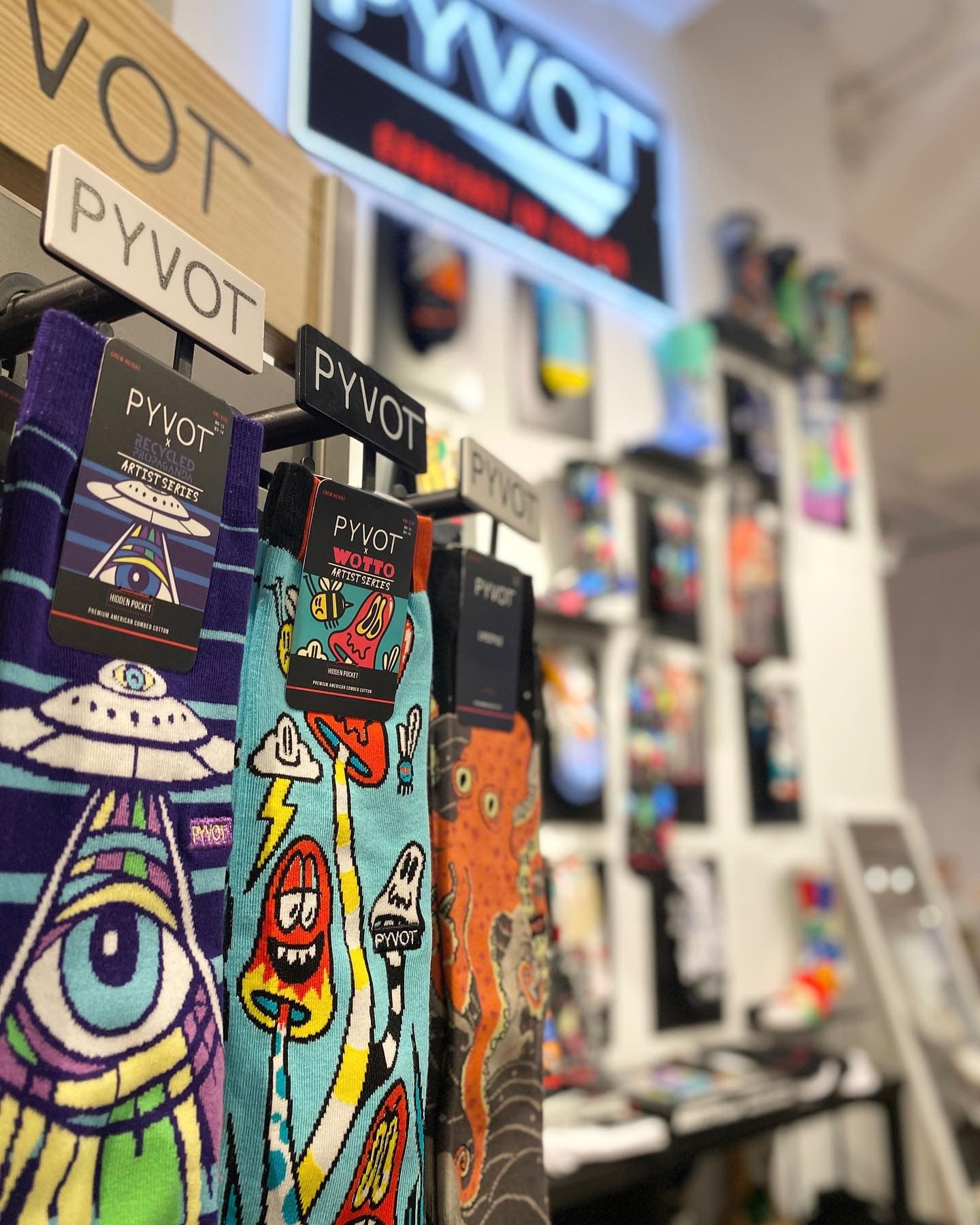 PYVOT artist socks on display